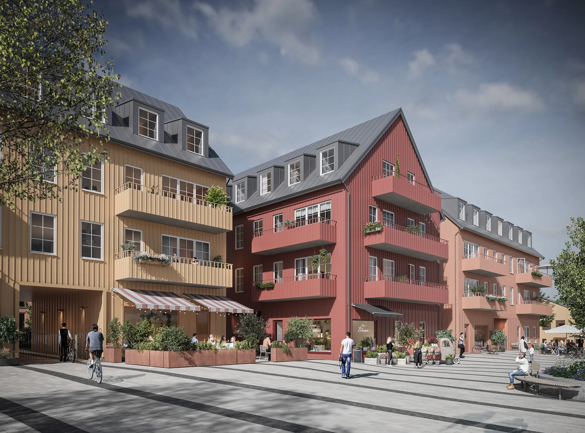 Torg framför flerbostadshus i rött och gult trä.